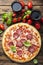 Italian pizza with tomato and salami