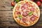 Italian pizza with tomato and salami