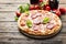 Italian pizza with tomato and salami