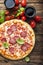 Italian pizza with tomato and salami