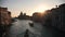 Italian port. Sunset. Boats sailing on the river.