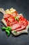 Italian prosciutto crudo or spanish jamon, sausage and cheese