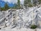 Italian quarry with smooth sections of marble in the Ruskeala Mountain Park on a sunny summer day