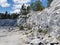 Italian quarry with smooth sections of marble in the Ruskeala Mountain Park on a sunny summer day