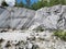 Italian quarry with smooth sections of marble in the Ruskeala Mountain Park on a sunny summer day