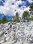 Italian quarry with smooth sections of marble in the Ruskeala Mountain Park on a sunny summer day