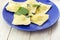 Italian ravioli garnished with cut parsley