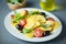 Italian ravioli salad with rocket and tomato