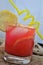 Italian red appetizer drink with lemon and ice aperitif  spritz beverage