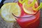 Italian red appetizer drink with lemon and ice spritz beverage