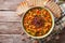 Italian ribollita vegetable soup close up in a bowl. Horizontal