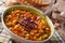 Italian ribollita vegetable soup close up in a bowl. Horizontal