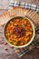 Italian ribollita vegetable soup close up in a bowl. vertical to