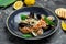 Italian risotto with shrimps, mussels, octopus, clams. Mediterranean cuisine. Restaurant menu, dieting, cookbook recipe top view