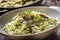 Italian risotto zucchini mushrooms and parmesan in white plate