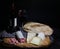 Italian salumi, cheese, bread and wine still life