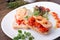 Italian sandwich bruschetta with shrimps served on white plate