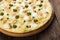 Italian seafood pizza at wood background