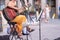 Italian Singer With Guitar Exhibits On The Street In Italy