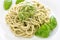 Italian spaghetti with pesto alla genovese sauce