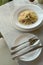 Italian Spahgetti cream source with mushroom and ham serve on white dish in restaurant