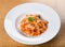 Italian spicy penne arrabiata or pasta al`arrabiata. Arrabbiata sauce is a spicy sauce for pasta