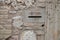 An italian stone letterbox in a medieval village. Ancient mailbox in Italy