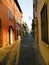 Italian street in old city, Rimini, Italy. Europe. Nooks and crannies in the Rimini. Narrow Alley With Old Buildings In Typical It