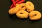 Italian Tarallini with red peppers on slate background