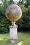 Italian terracotta jar on a column at Hever castle garden in England