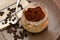 Italian tiramisu sweet pie in glass jar with coffee cocoa mascarpone cheese and savoiardi cookies