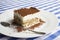 Italian tiramisu. Tiramisu is a cold cake that is assembled in layers. and has ingredients like cocoa, mascarpone and coffee.