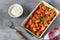 Italian traditional baked dish`Gnocchi al Pomodoro e Basilico`