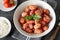 Italian traditional baked dish`Gnocchi al Pomodoro e Basilico`