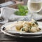 Italian traditional codfish with onion and parsley