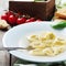 Italian traditional cooked tortellini on the table