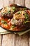 Italian veal steak Ossobuco alla milanese with spicy sauce close