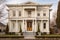 italianate building exterior with corbel and scroll detail