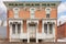 italianate building facade with ornamental corbels
