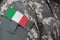 Italy army uniform patch flag on soldiers arm. Military Conceptn