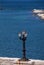 Italy.  Bari. The Lungomare.  View with a three-light lamppost facing the Adriatic Sea