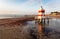 Italy beach - Lignano Sabbiadoro Lighthouse with beach at sunrise