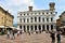 Italy, Bergamo - view on the New Palace at the Piazza Vecchio crowded with tourists