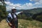 ITALY, CASTELMEZZANO , ANGEL FLIGHT- 14 MAY 2017, woman in a helmet and a suit before the Angel flight points to