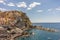 Italy, Cinque Terre, Manarola, Manarola, PANORAMIC VIEW OF BUILDINGS BY SEA AGAINST SKY