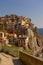 Italy, Cinque Terre, Manarola,PANORAMIC VIEW OF SEA AND BUILDINGS AGAINST CLEAR SKY