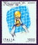 ITALY - CIRCA 1982: A stamp printed in Italy shows footballer holding aloft World Cup, circa 1982.