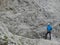 Italy. Dolomite. Hiker is standing on a rock.