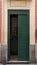 Italy: Green doorway in Varese street.