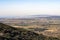 Italy Grosseto Maremma, route in MTB and EMTB in the woods of Gavorrano up to Mount Calvo, panoramic view of the village and the